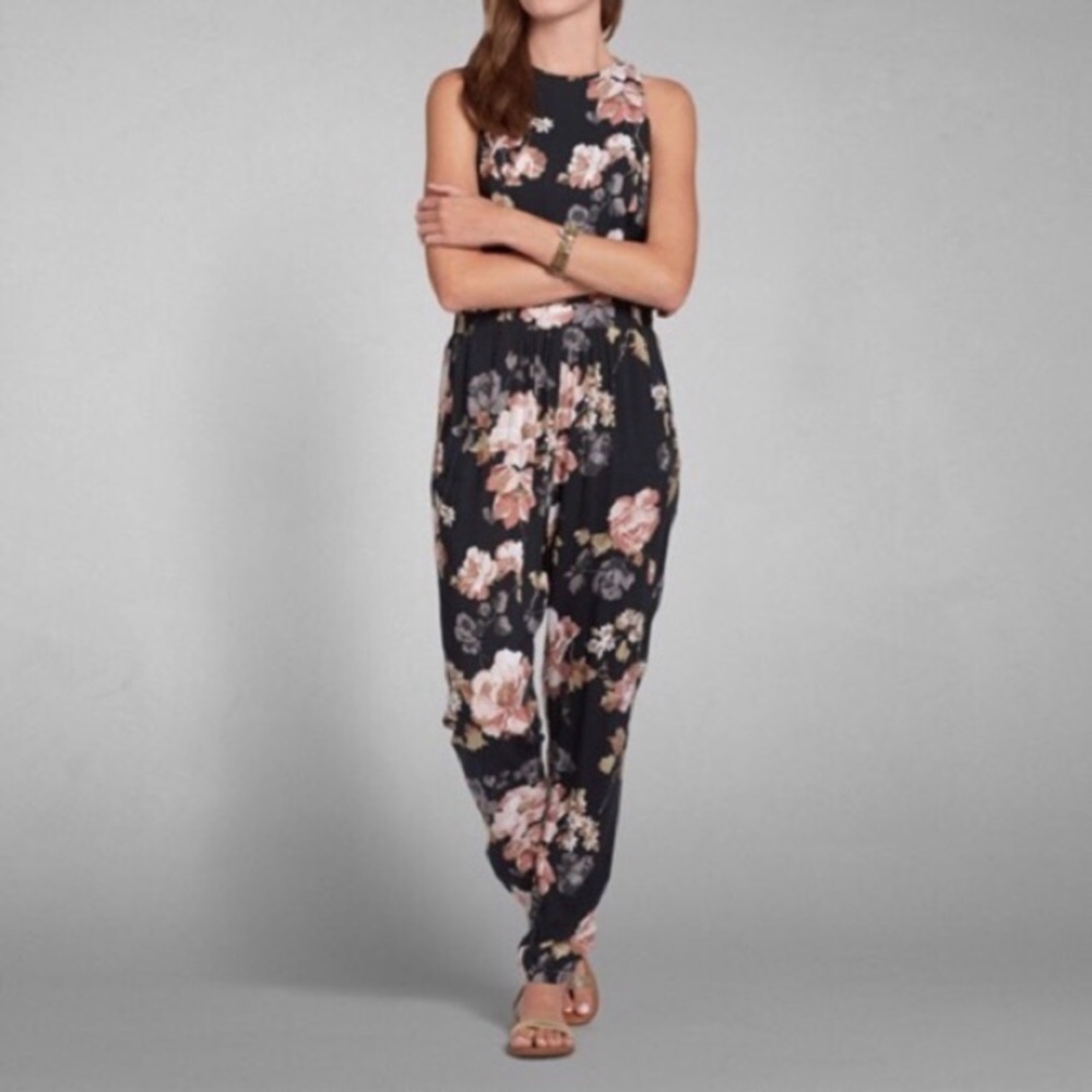 Gently worn floral jumpsuit - size small